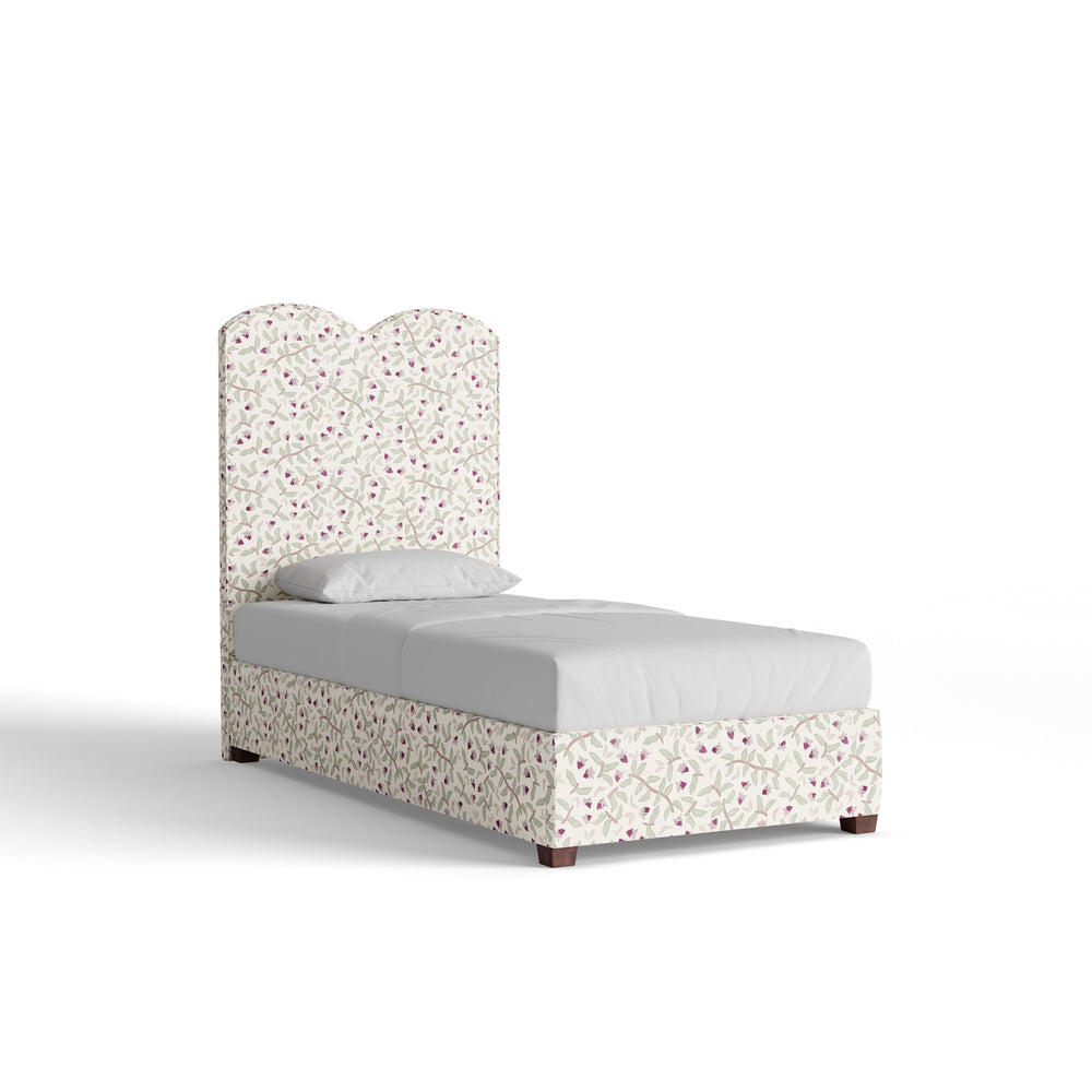 Gold-toned bed frame with curved arches and long side rail