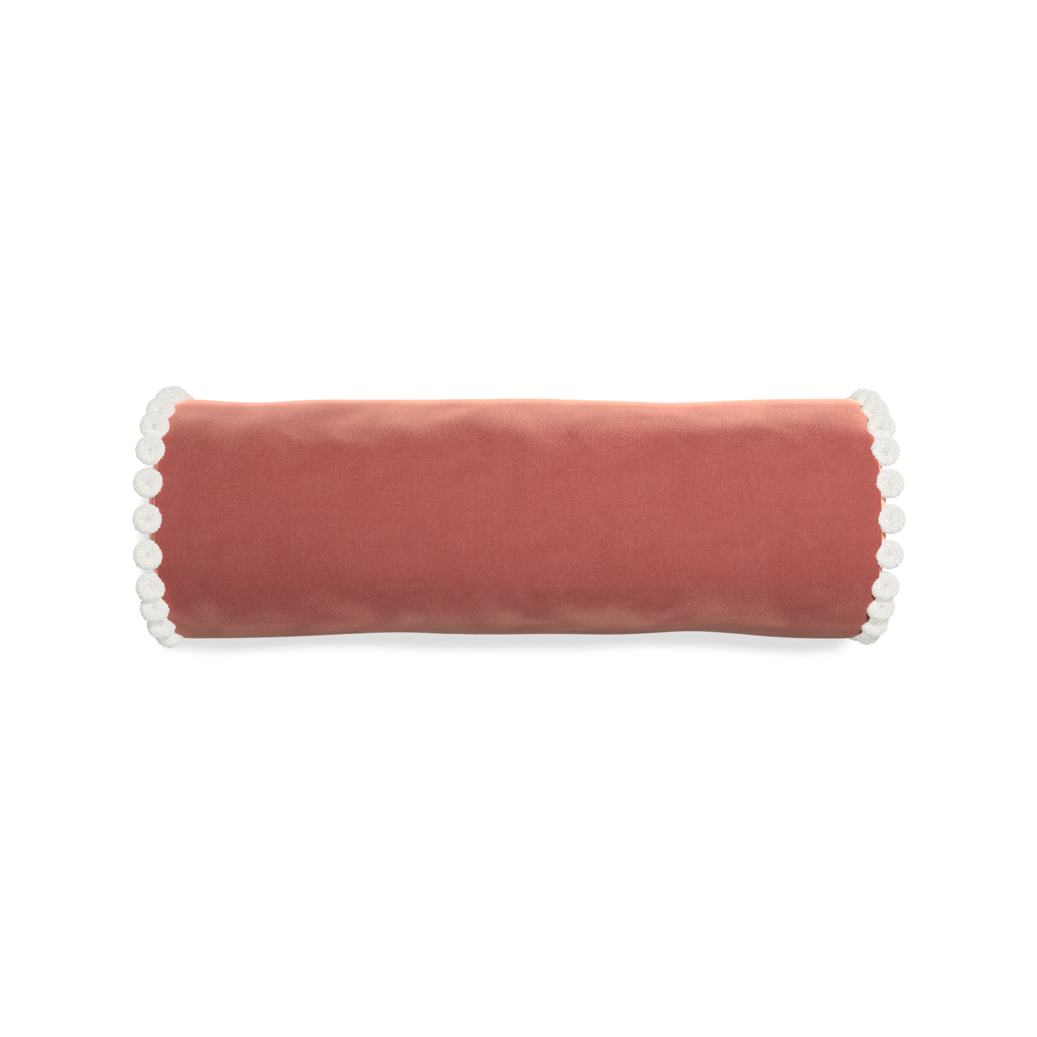 bolster coral velvet pillow with white pom poms