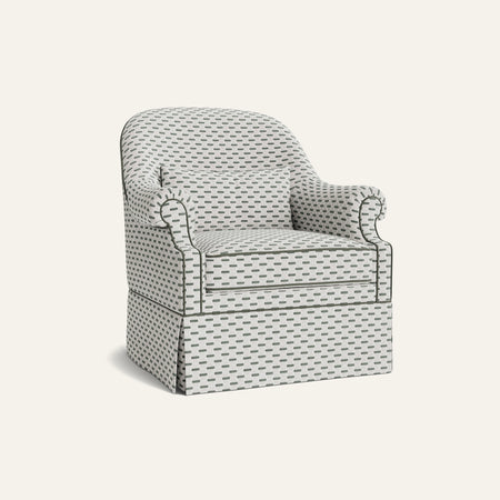 Another view of the armchair with a green and white patterned fabric
