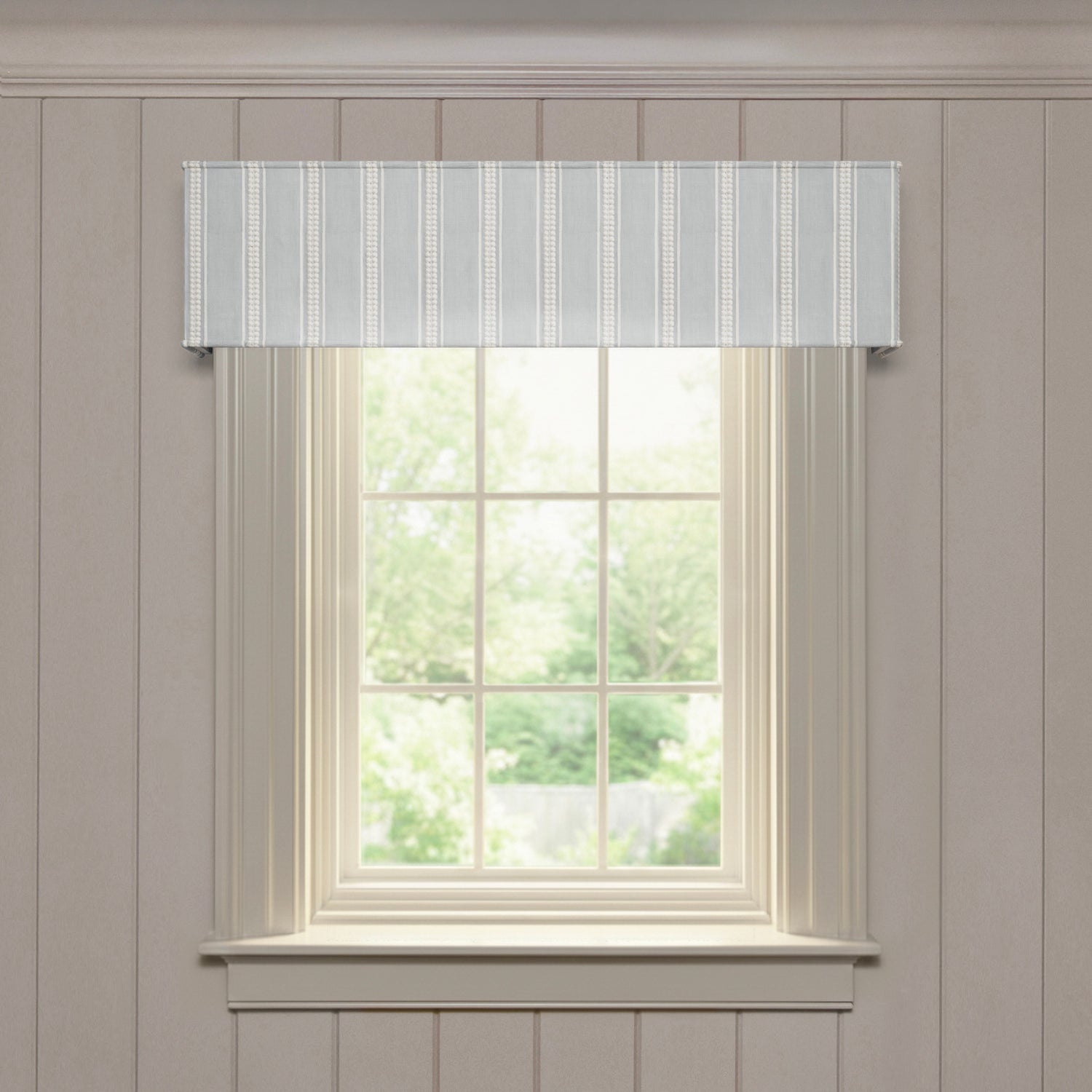 Margot Mist custom cornice with soft embroidered vertical stripes, designed for made-to-order window accents and style