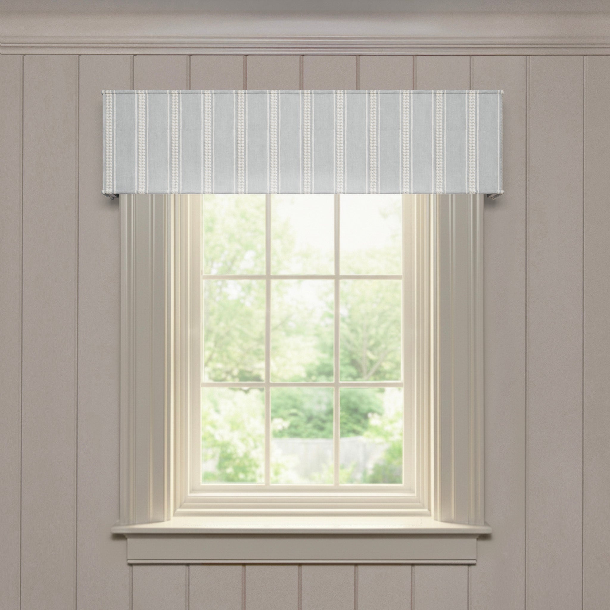 Margot Mist custom cornice with soft embroidered vertical stripes, designed for made-to-order window accents and style