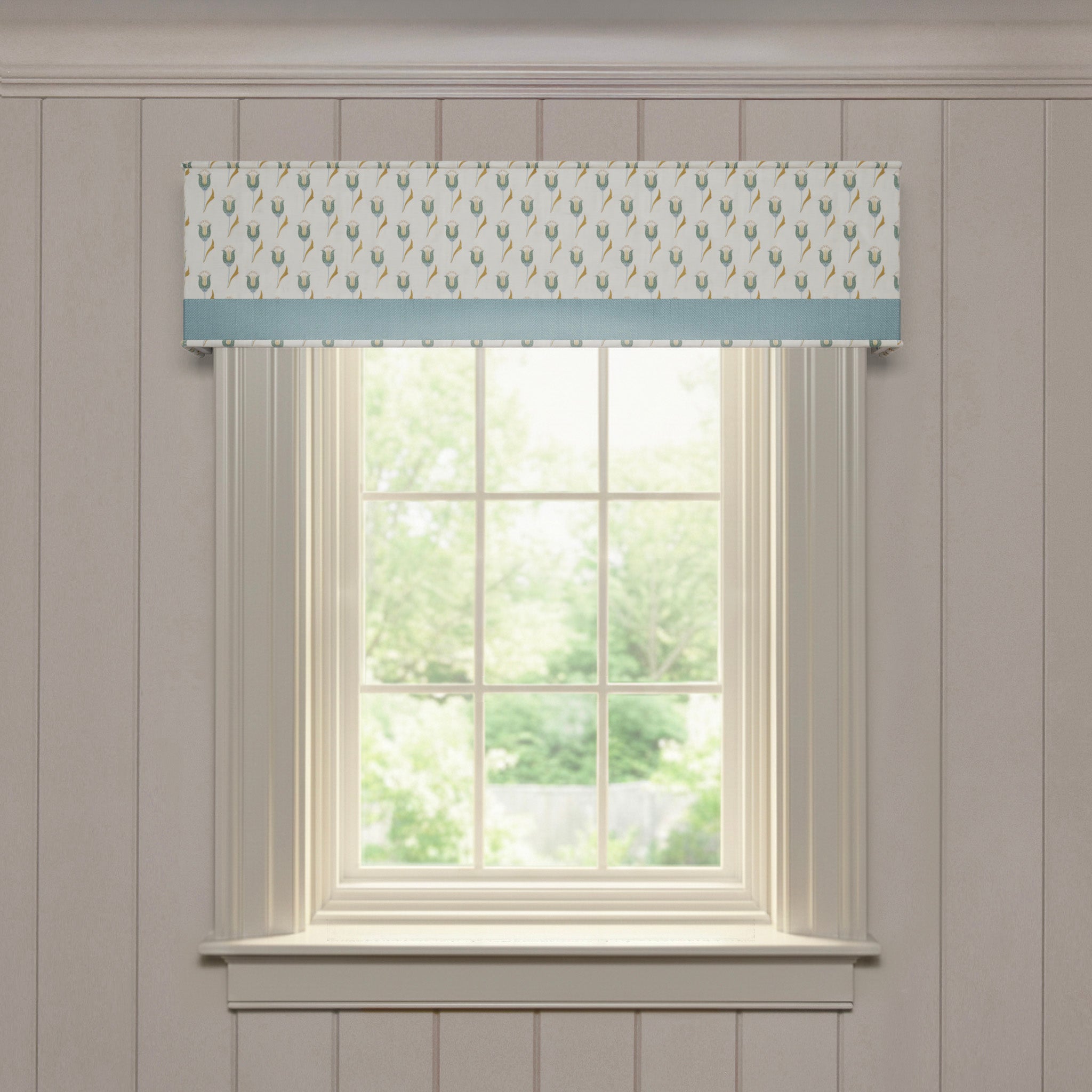 Annabelle Peacock custom cornice with delicate peacock feather print and soft blue trim, made-to-order window treatment