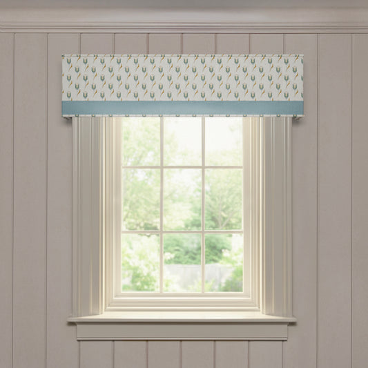 Annabelle Peacock custom cornice with delicate peacock feather print and soft blue trim, made-to-order window treatment