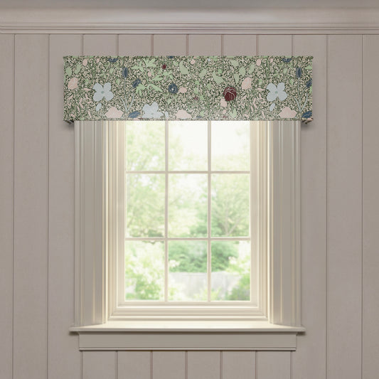 Matilda custom cornice with botanical green and pastel floral print, crafted for made-to-order window decor