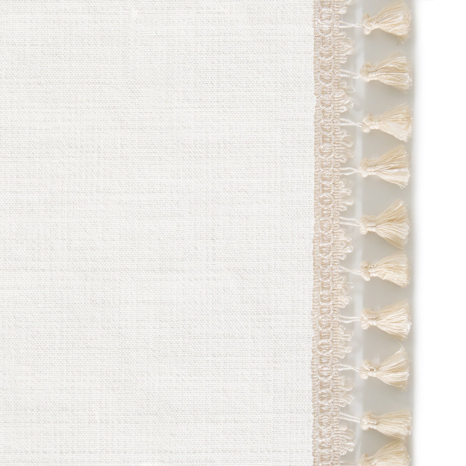 Upclose picture of Snow custom Whiteshower curtain with cream tassel trim