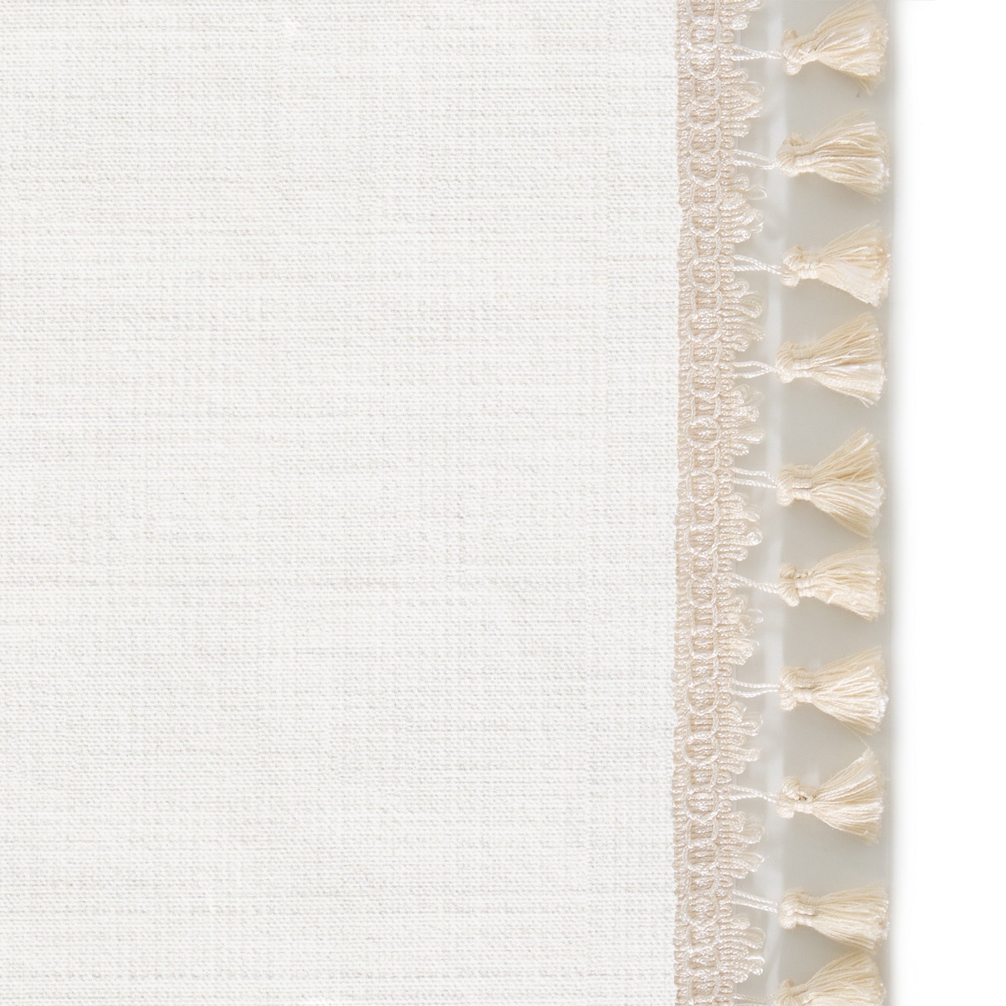 Snow Curtains (Set of 2) featuring cream tassels on a custom blackout curtain panel for elegant home decor by Pepper Home.