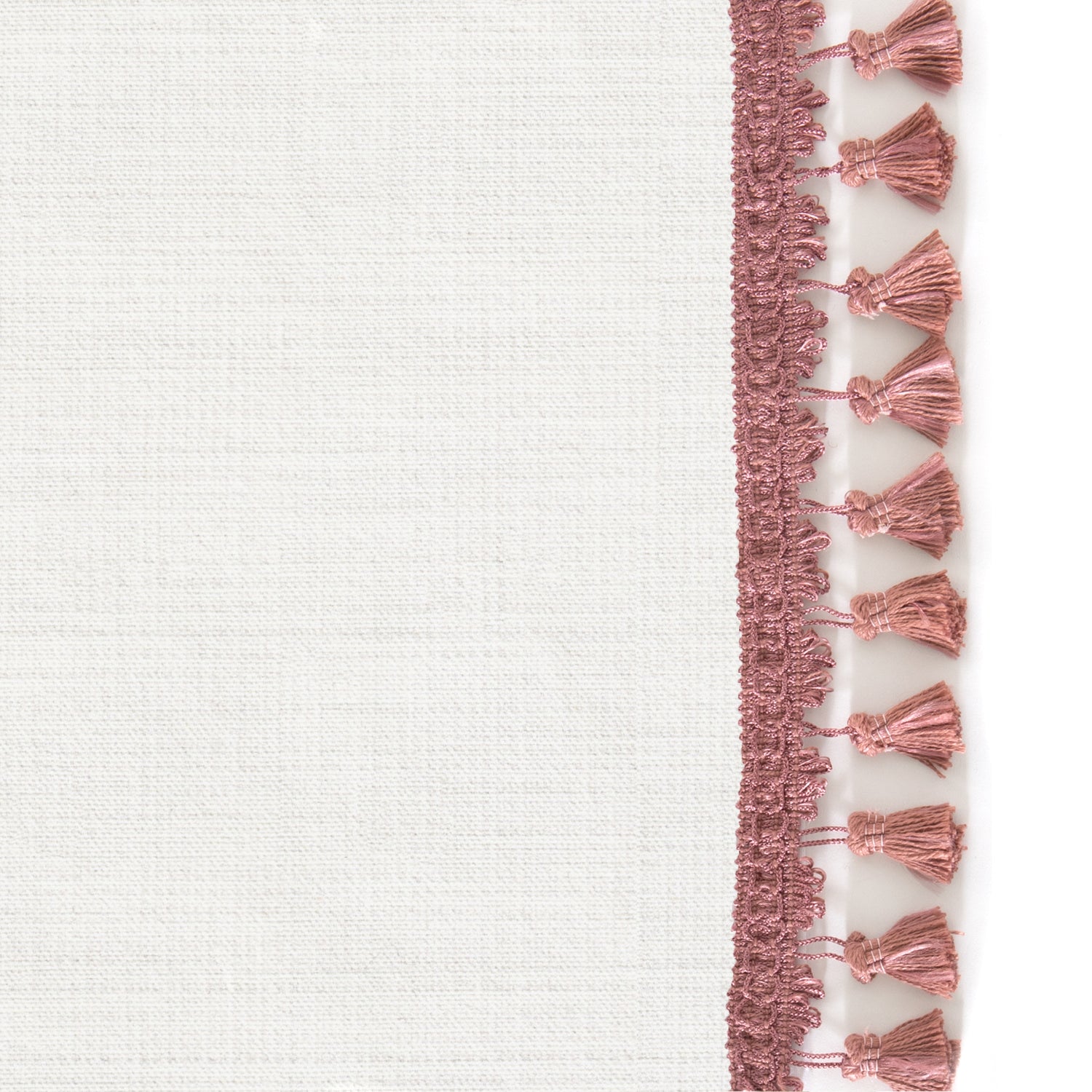 Upclose picture of Snow custom Whiteshower curtain with dusty rose tassel trim