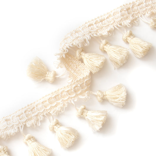 cream tassel close up 
