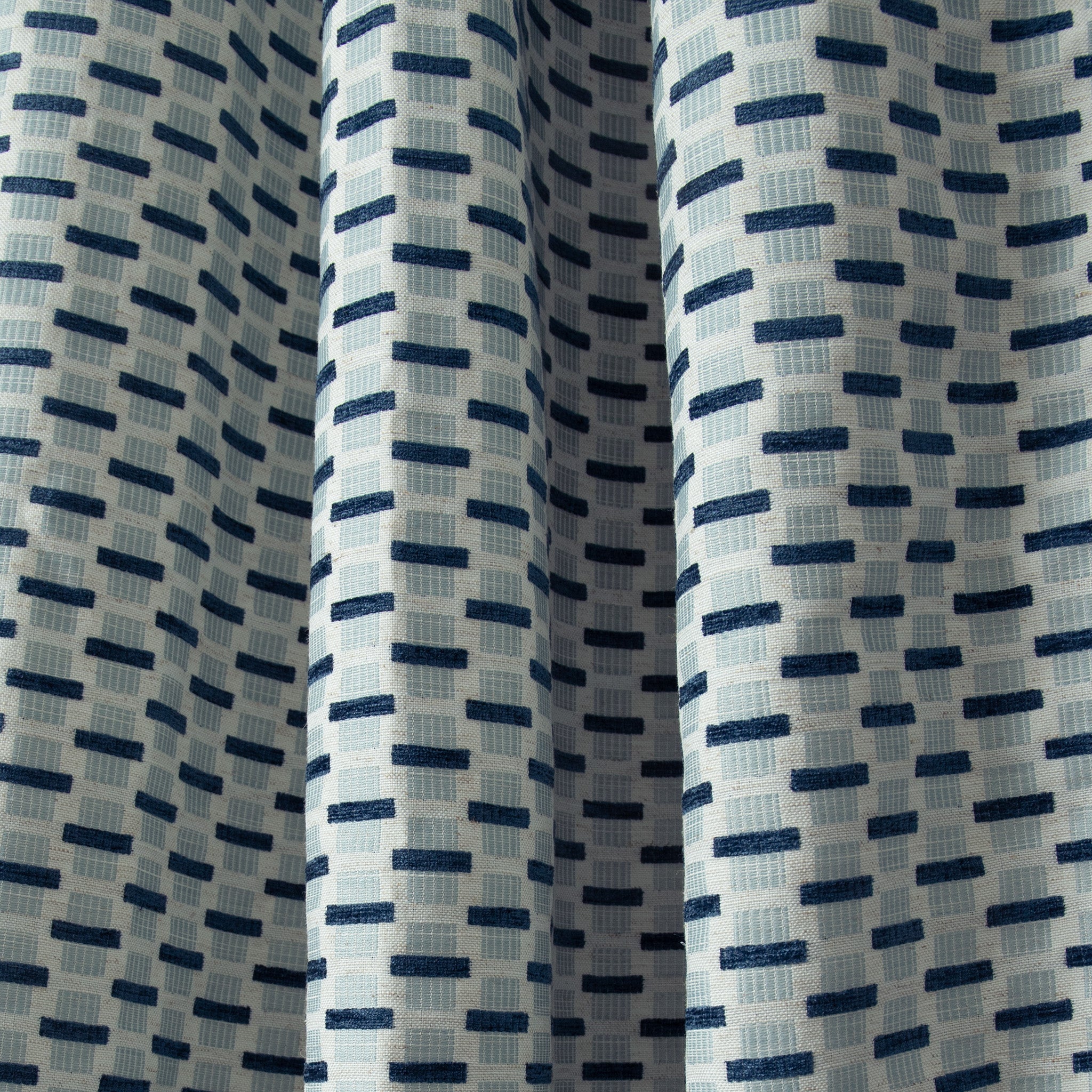 close up of blue abstract geometric curtain