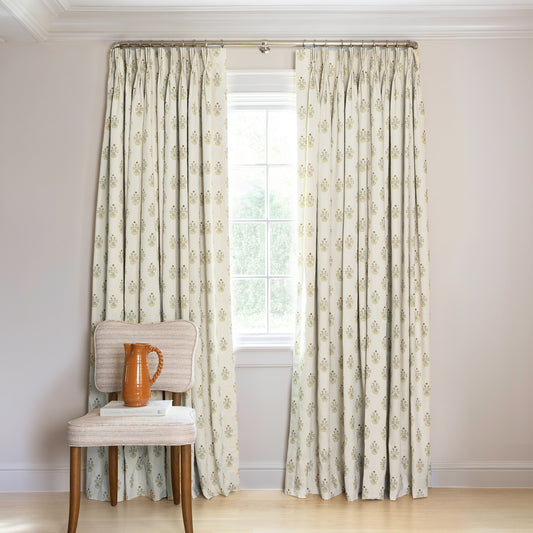 Lucie Chamomile Tailored Pleat curtains with soft floral print on cream, made-to-order with short lead times, crafted in the USA quality