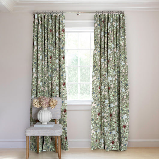 Matilda Tailored Pleat custom curtains by Pepper Home in a floral pattern, adding elegance and style to any room.