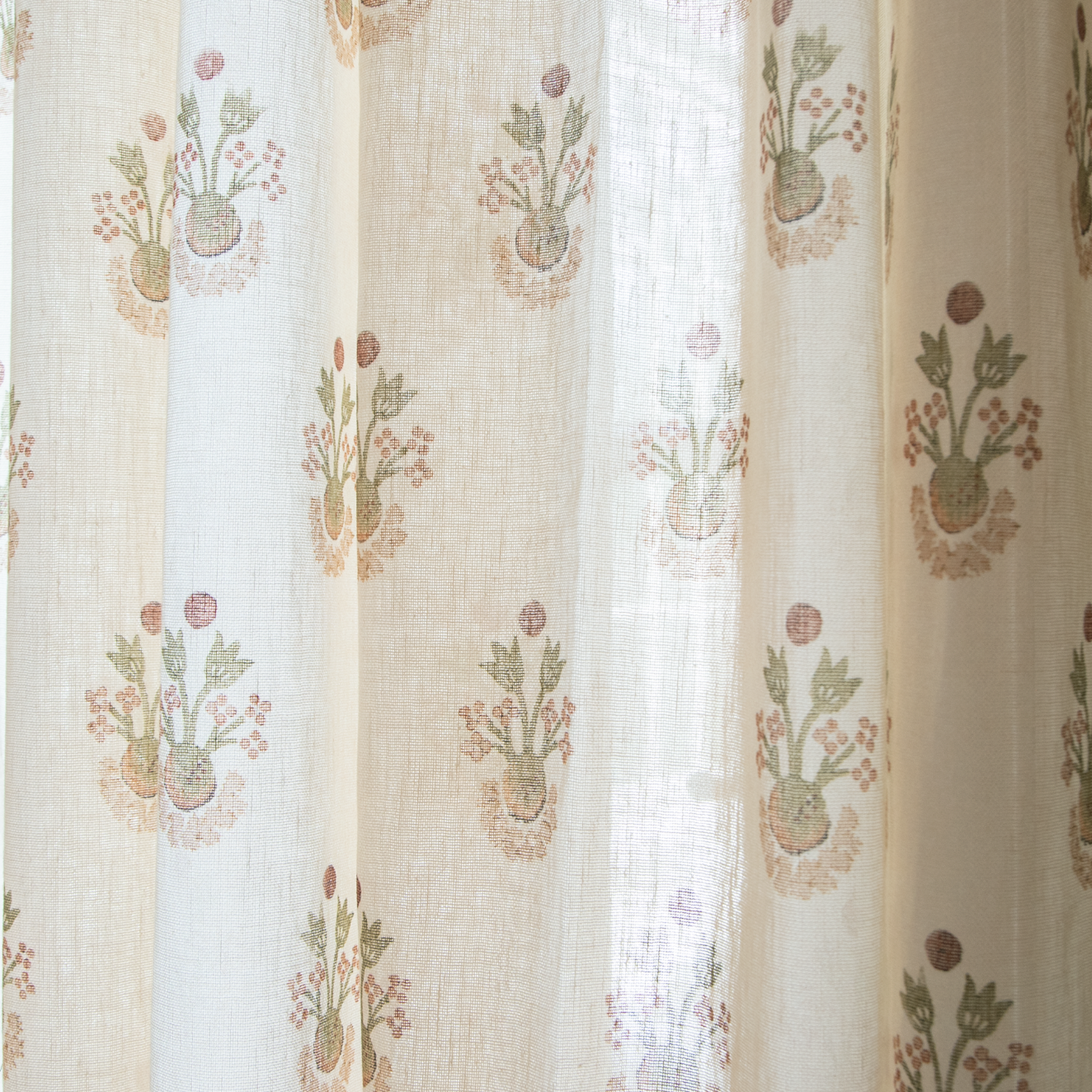 Lucie Clay sheer curtain fabric with soft botanical motifs on cream, made-to-order, short lead times, manufactured in the USA quality