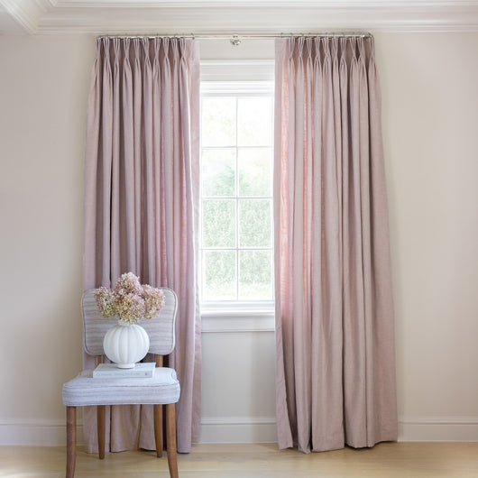 Orchid Tailored Pleat curtains in soft hues enhance light-filled rooms with custom, made-to-order elegance by Pepper Home.