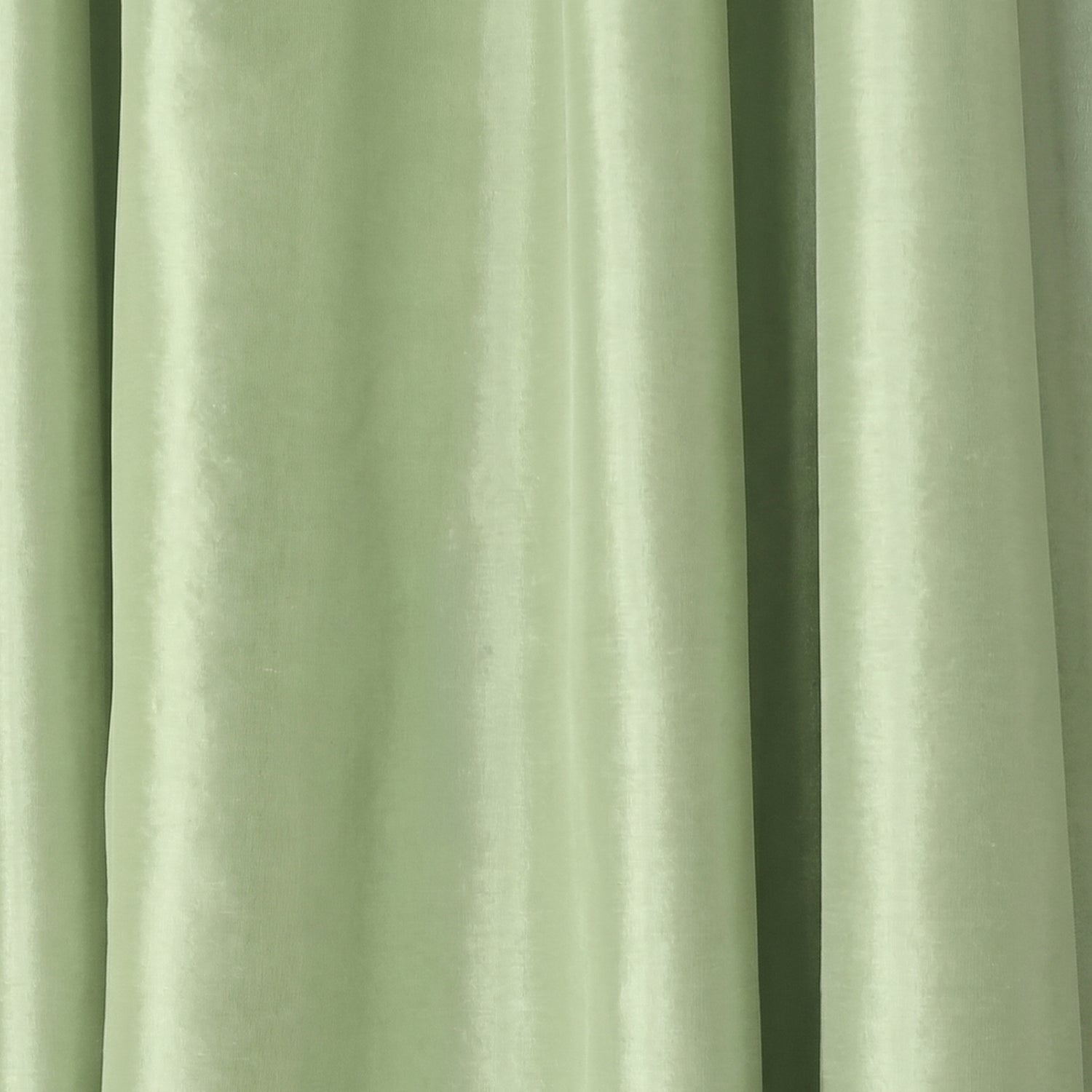 Matcha solid silk curtain fabric in soft green with subtle sheen, made-to-order, short lead times, manufactured in the USA