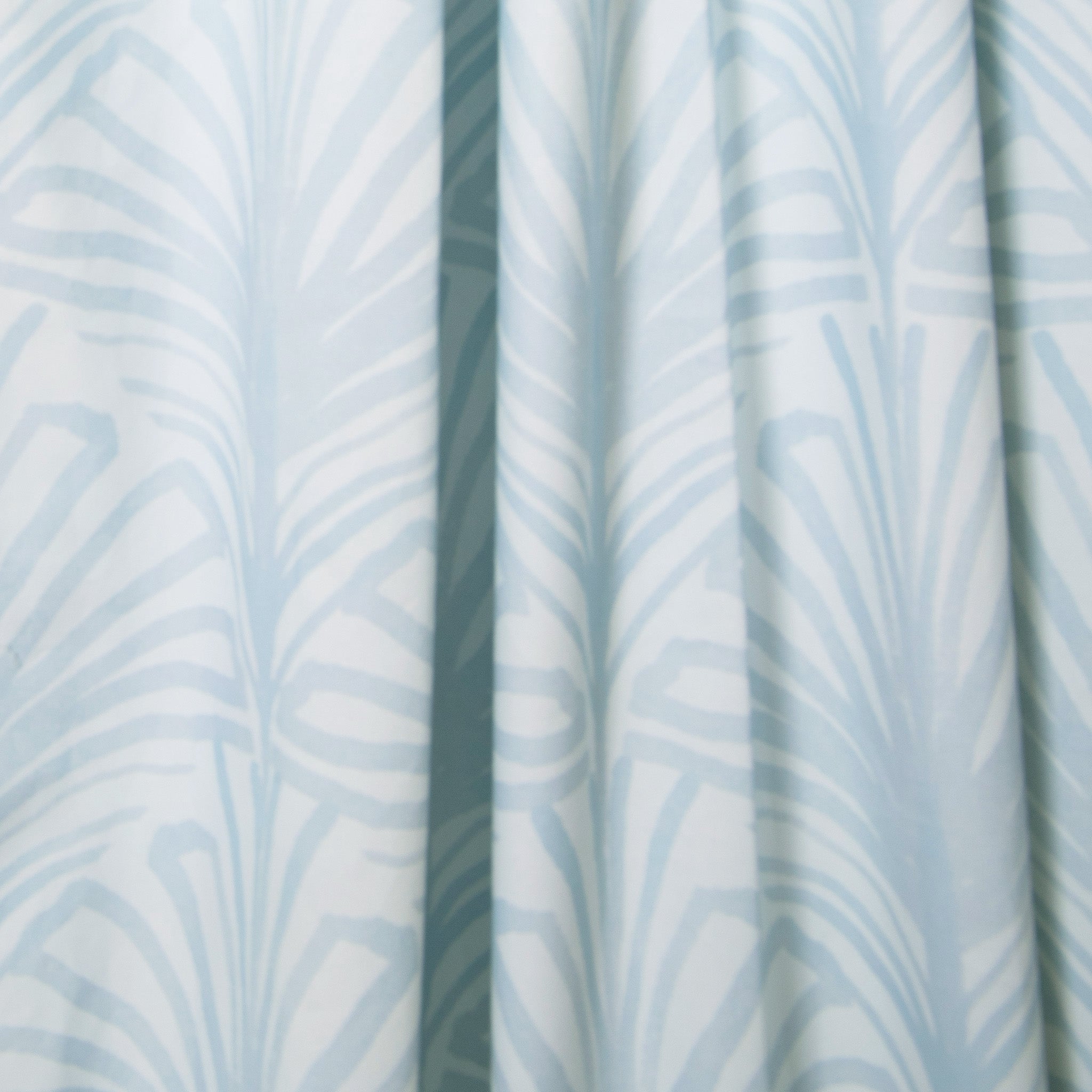 close up of Sky Blue Palm Printed Cotton curtain 