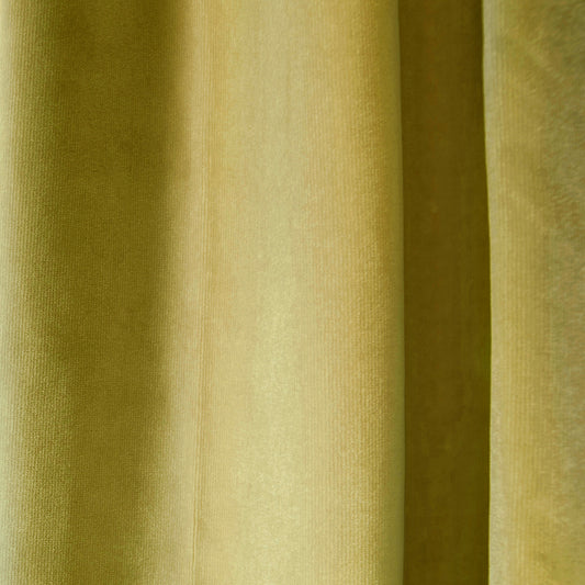 close up of golden chartreuse curtains