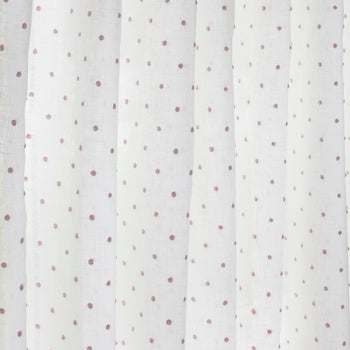 close up of white sheer curtain with embroidered pink polka dots