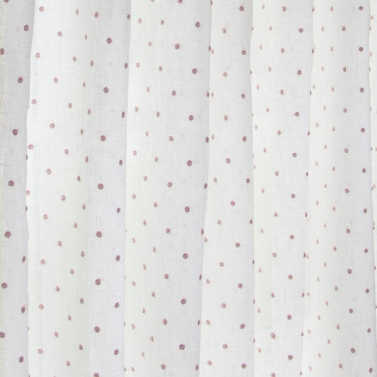 close up of white sheer curtain with embroidered pink polka dots