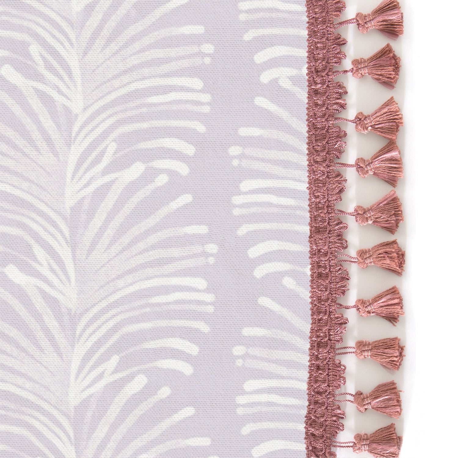 Upclose picture of Emma Lavender custom curtain with dusty rose tassel trim