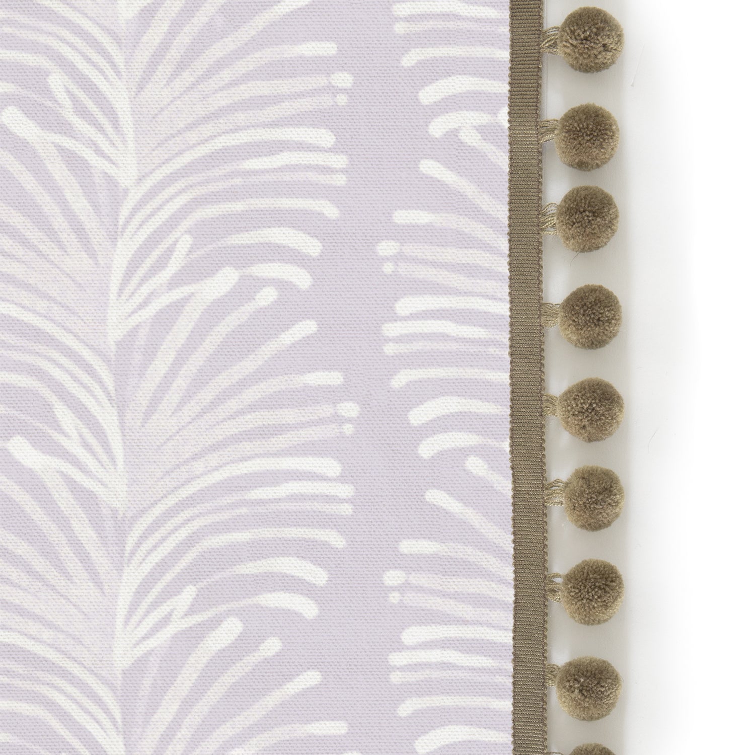 Upclose picture of Emma Lavender custom shower curtain with olive pom pom trim