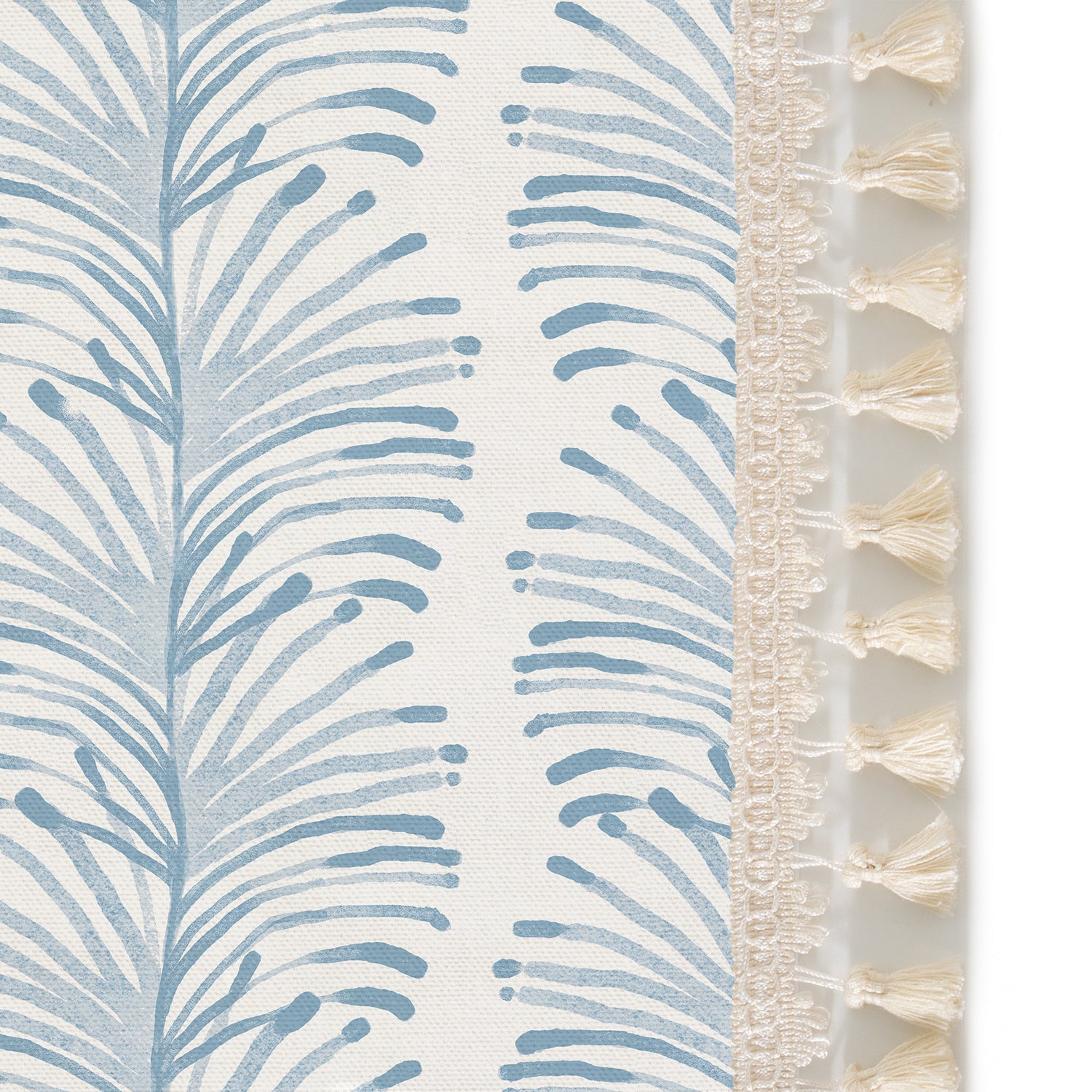 Upclose picture of Emma Sky custom Sky Blue Botanical Stripecurtain with cream tassel trim