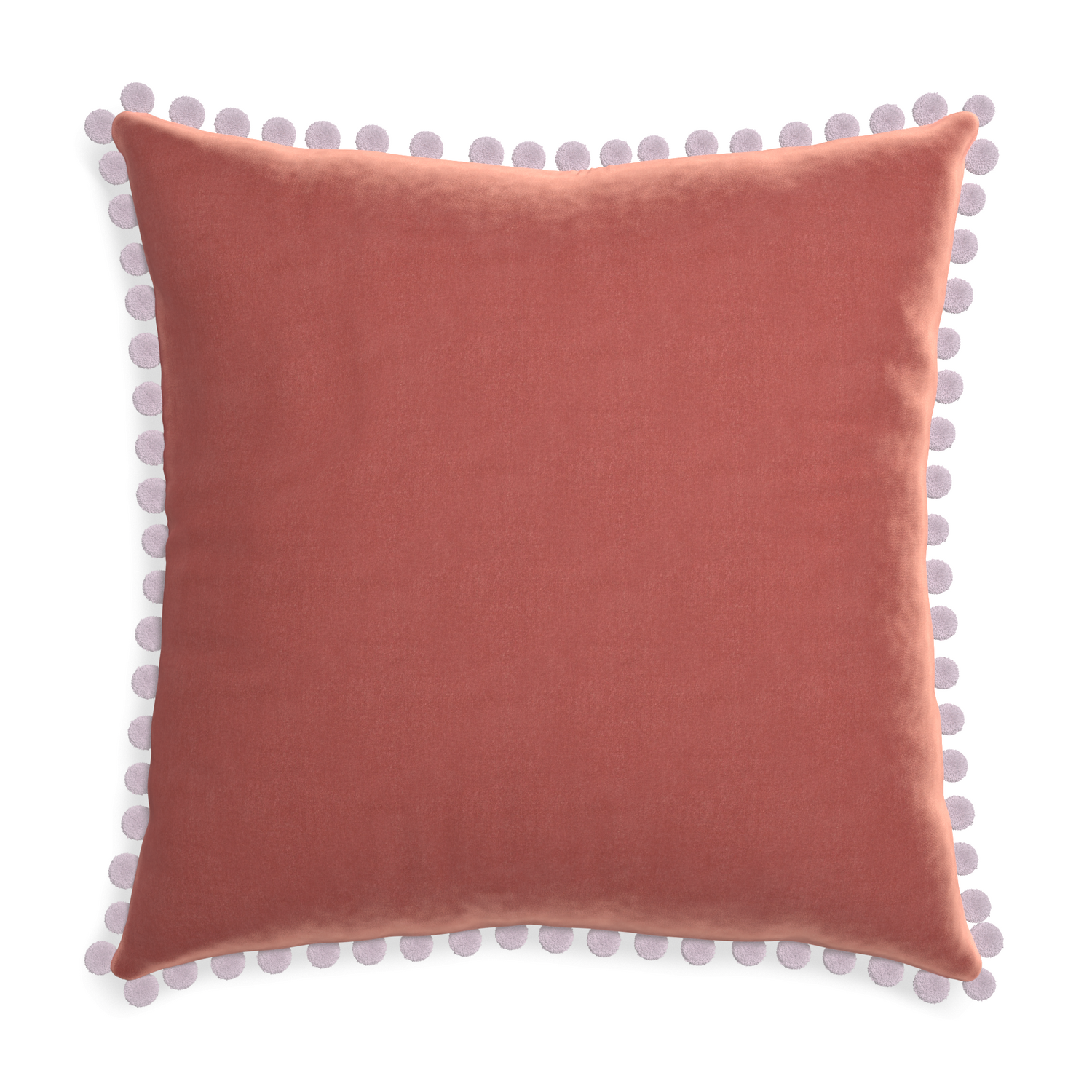 square coral velvet pillow with lilac pom poms