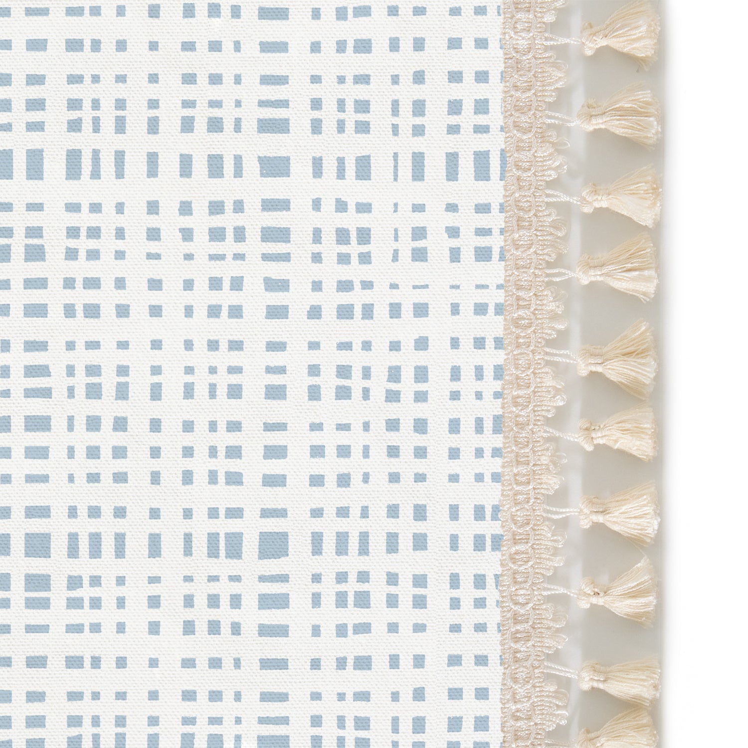 Upclose picture of Ginger Sky custom Sky Blue Ginghamshower curtain with cream tassel trim