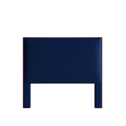 Midnight headboard by Pepper Home in deep blue cotton fabric, featuring a clean, custom mid-rise silhouette.