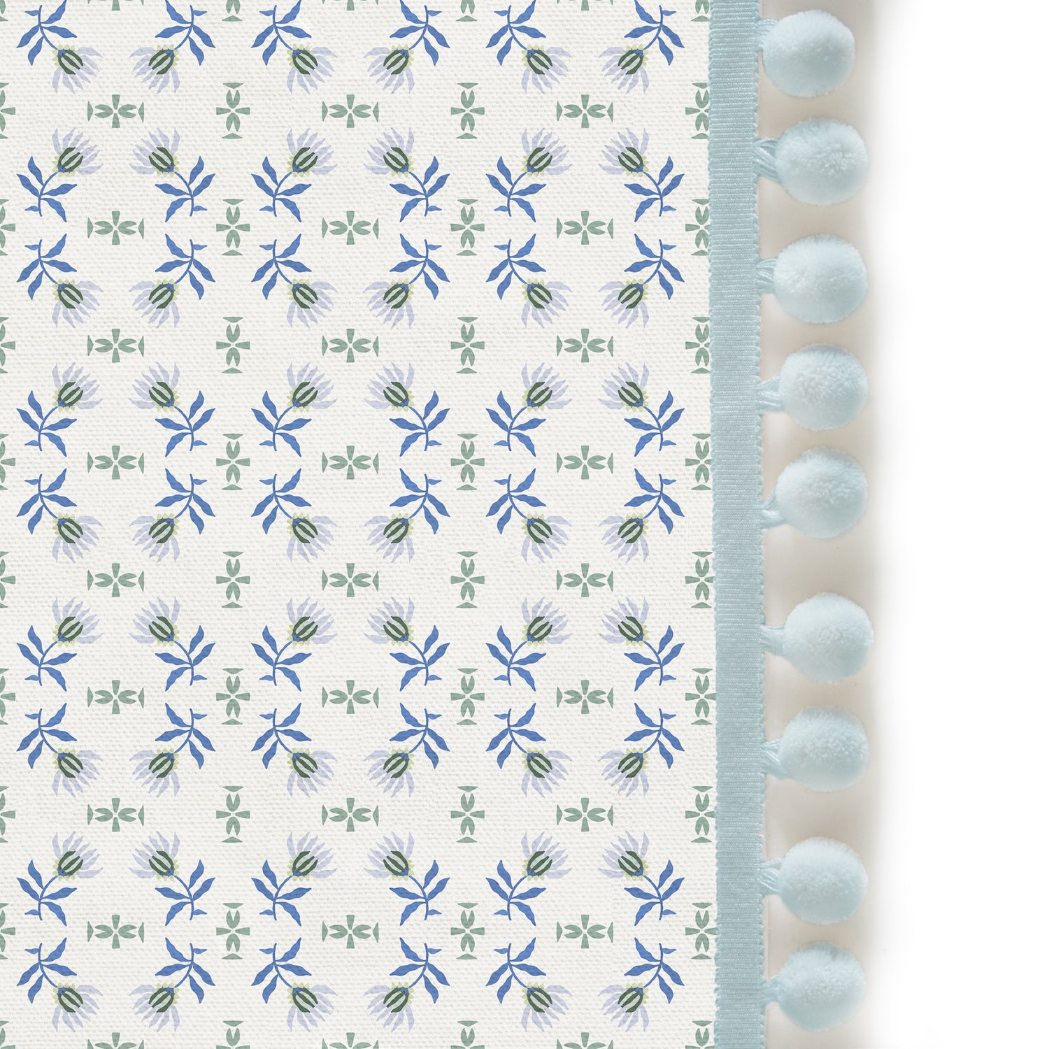 Upclose picture of Lee custom Blue &amp; Green Floralshower curtain with powder pom pom trim