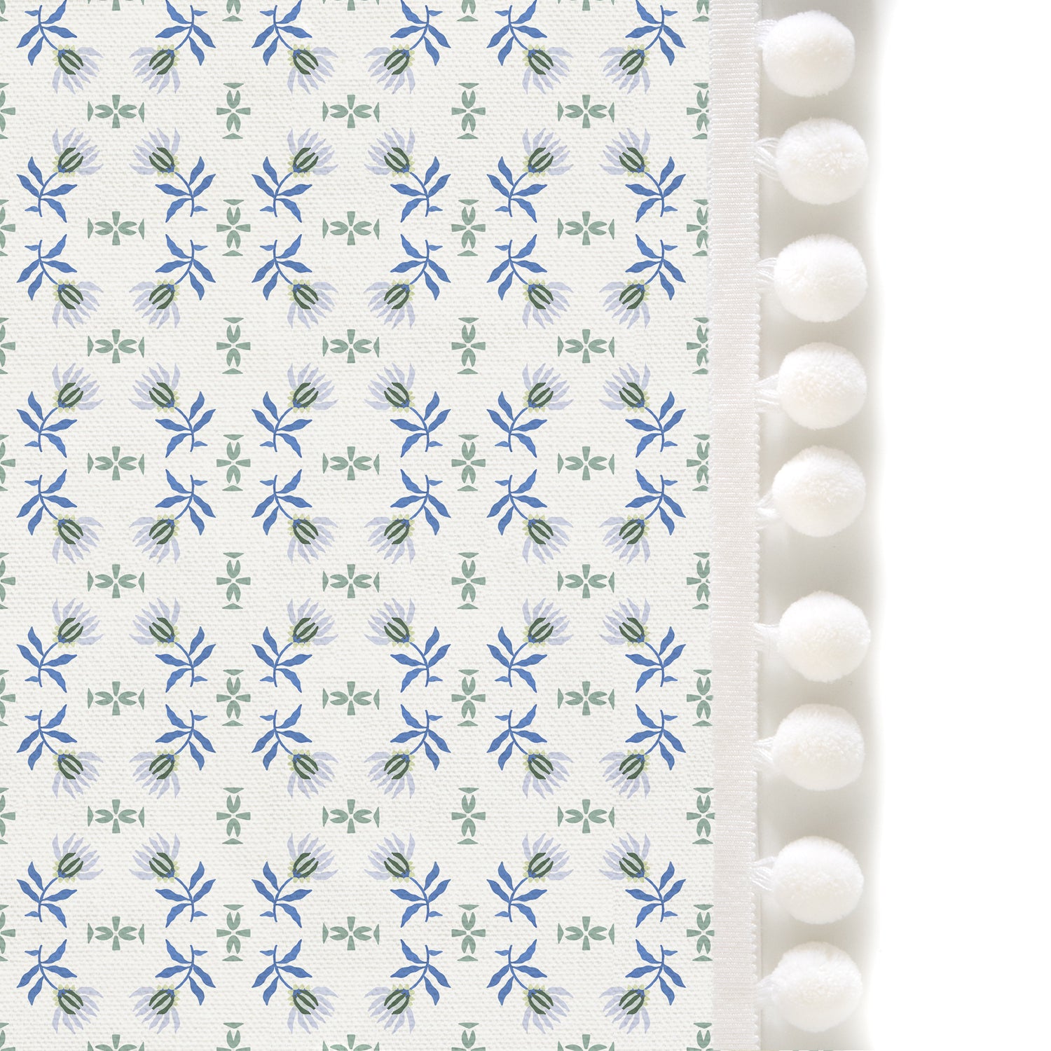 Upclose picture of Lee custom Blue &amp; Green Floralshower curtain with snow pom pom trim