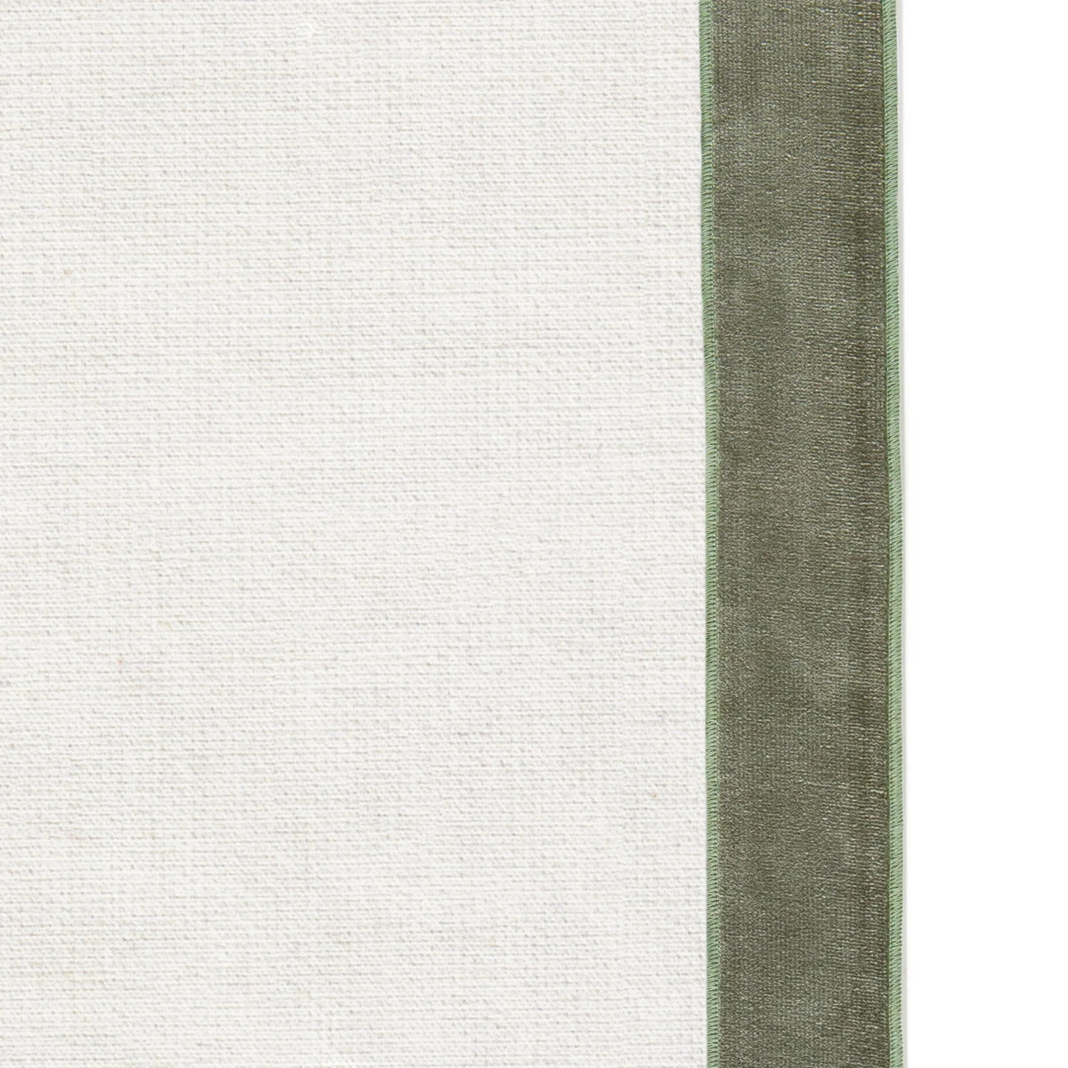 Flour Curtain (sold per panel) in a textured linen-cotton blend with custom tailored green velvet trim by Pepper Home.