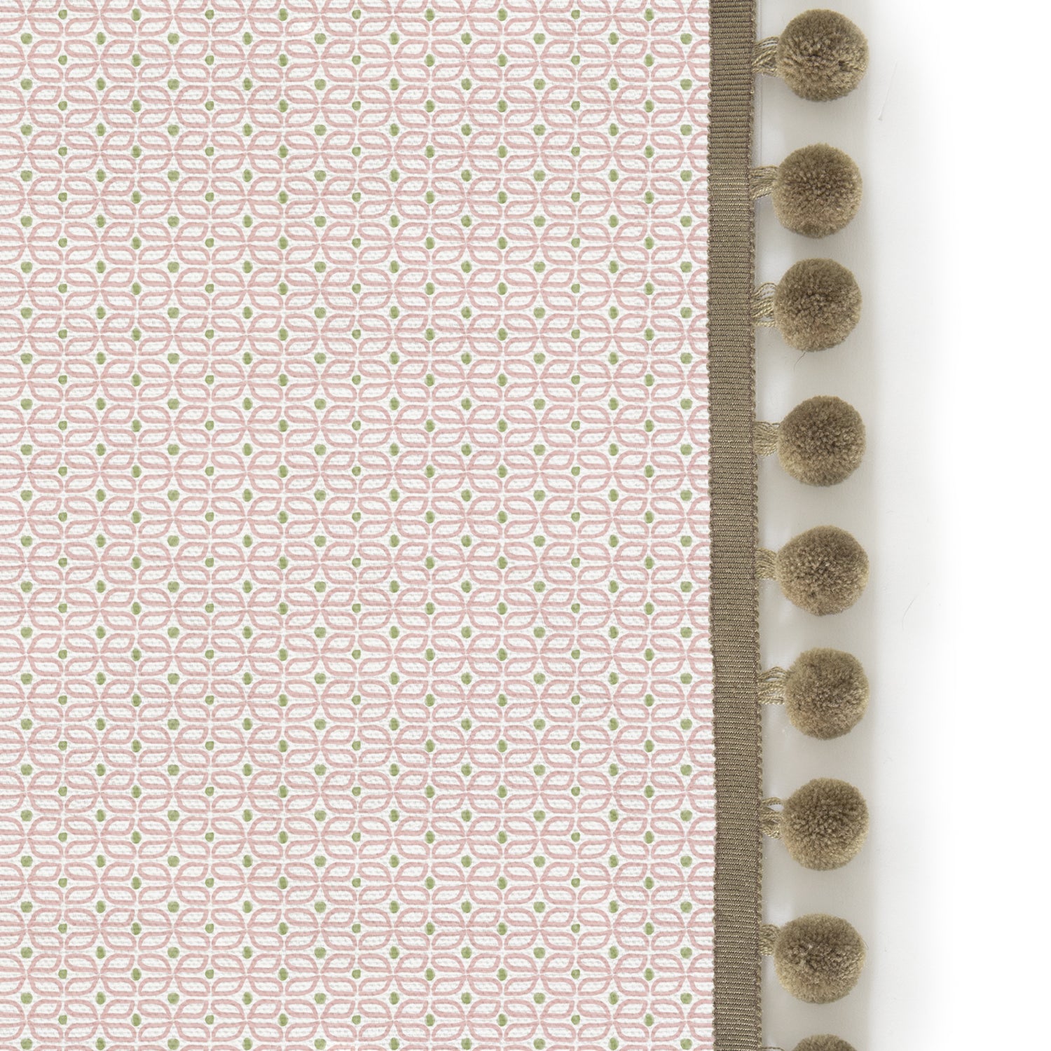 Upclose picture of Loomi Pink custom curtain with olive pom pom trim