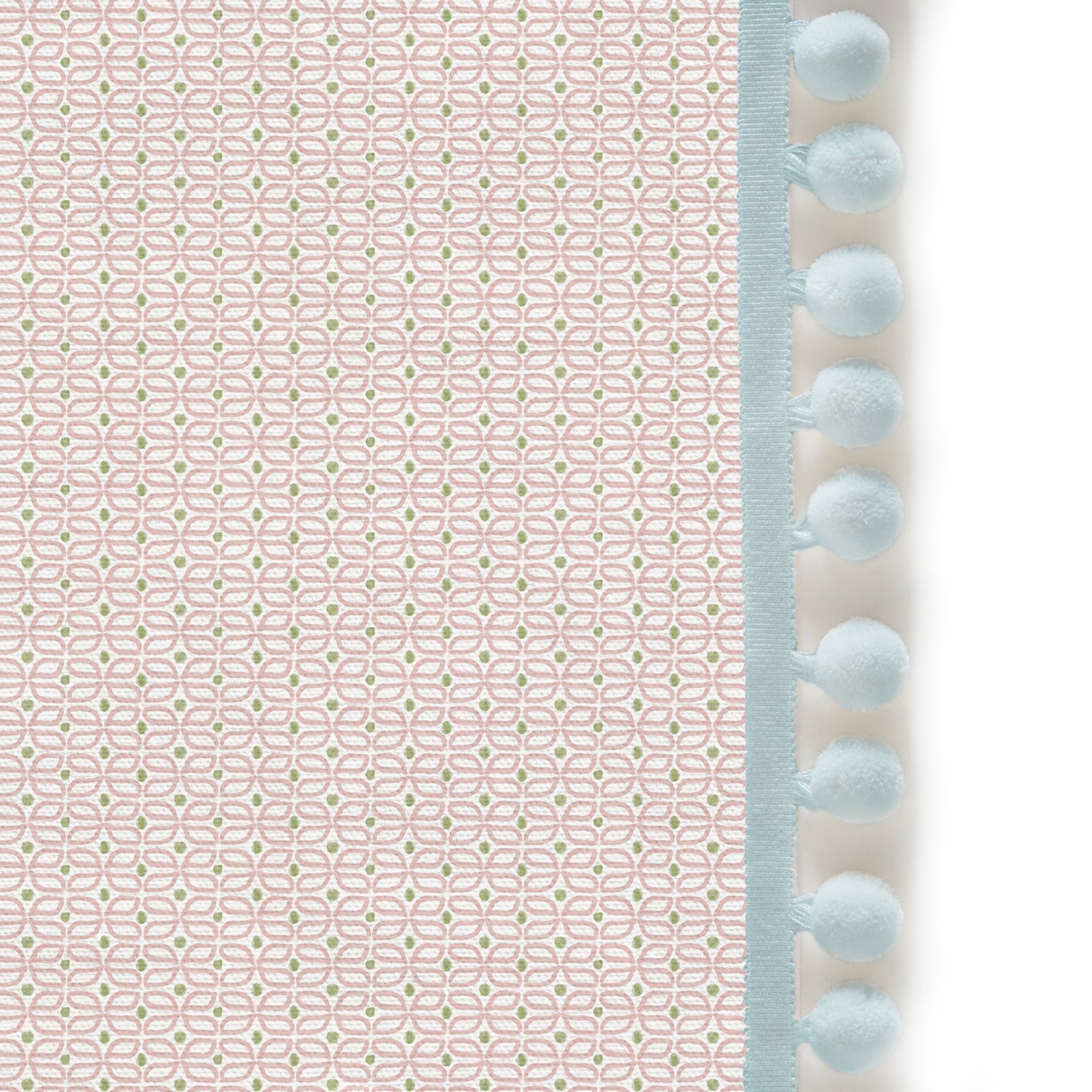 Upclose picture of Loomi Pink custom Pink Geometriccurtain with powder pom pom trim