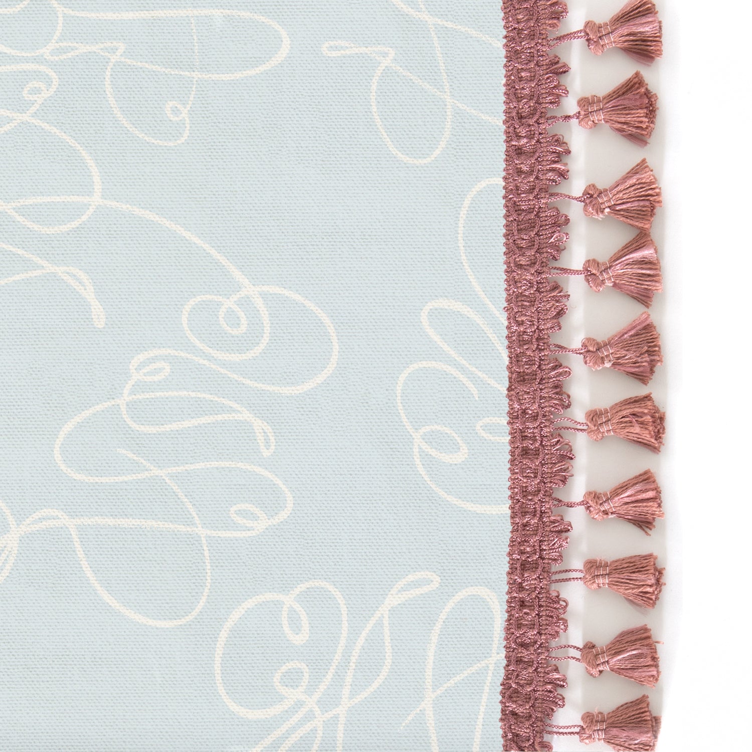 Upclose picture of Mirabella custom Powder Blue Abstractshower curtain with dusty rose tassel trim
