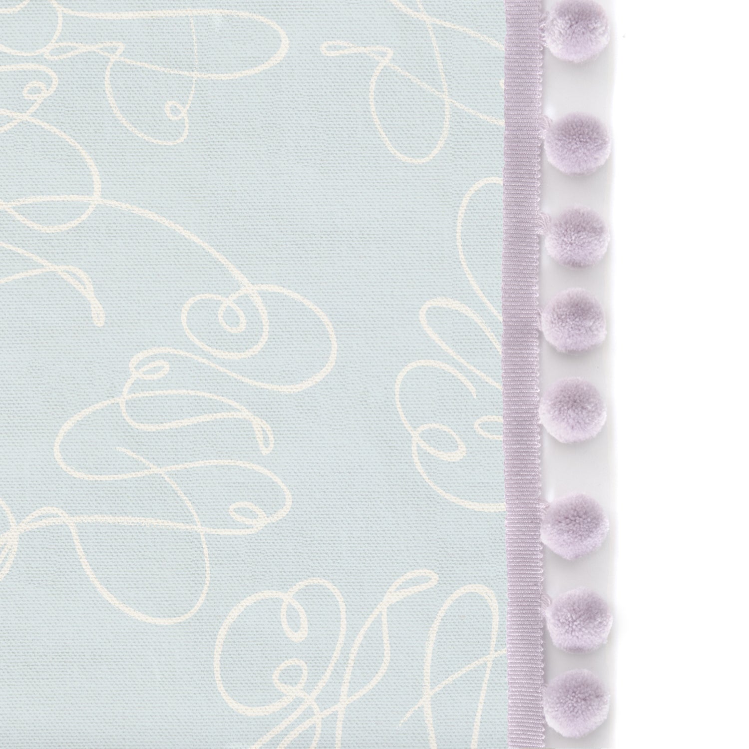Upclose picture of Mirabella custom Powder Blue Abstractshower curtain with lilac pom pom trim
