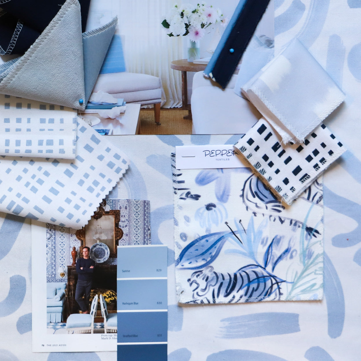 Interior design moodboard and fabric inspirations with Sky Blue Pattern Printed swatch, Blue With Intricate Tiger Design Printed Swatch, Sky Blue Gingham Printed Swatch, Black Gingham Printed Swatch, and Sky Blue Gingham Printed Swatch