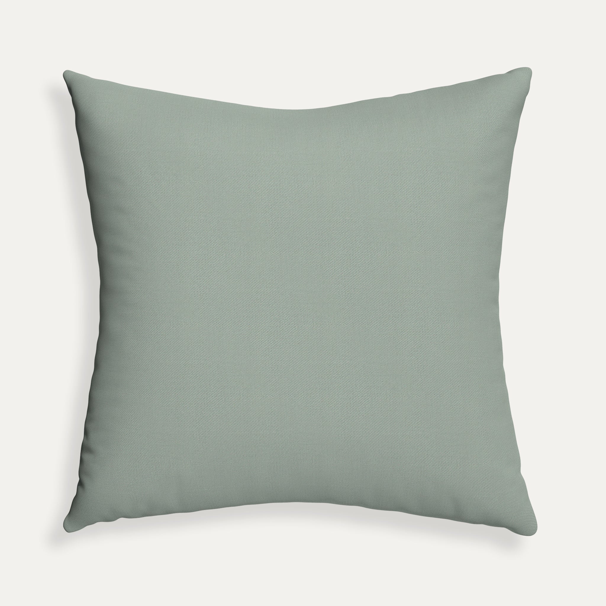 Sage made-to-order solid cotton pillow in soft green, manufactured in the USA with quick turnaround and quality materials