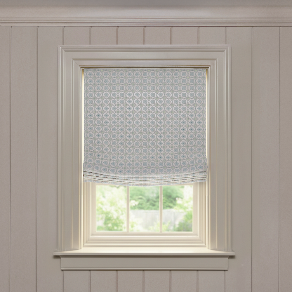 Hayes Sea Salt Relaxed custom Roman shade in soft sea salt fabric with subtle embroidered circle pattern, made-to-order design