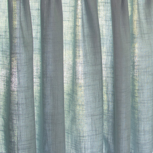 close up of grey blue fabric curtain 