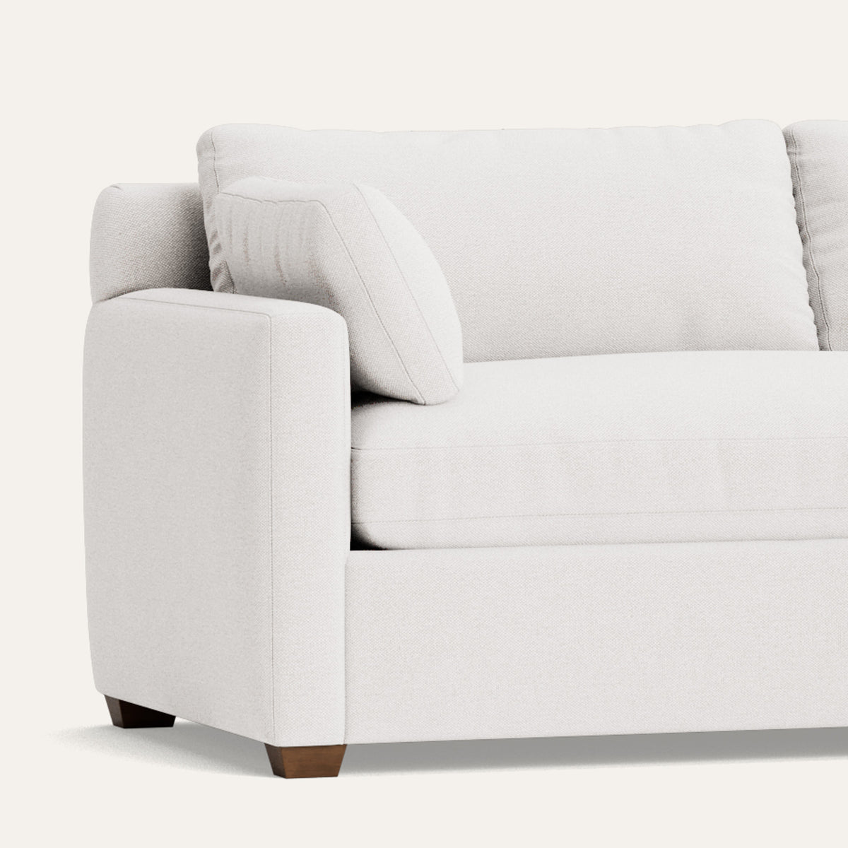 Ivory sectional sofa with tailored cushions, made to order in the USA with short lead times