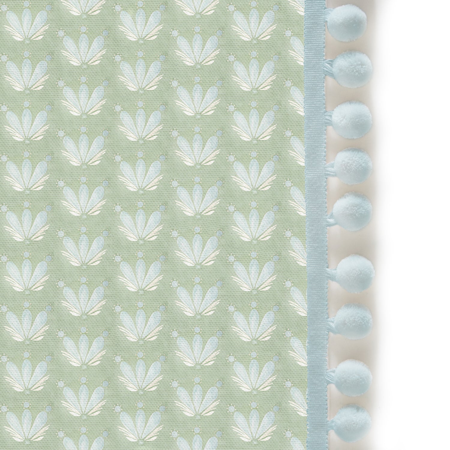 Upclose picture of Serena Sea Salt custom shower curtain with powder pom pom trim