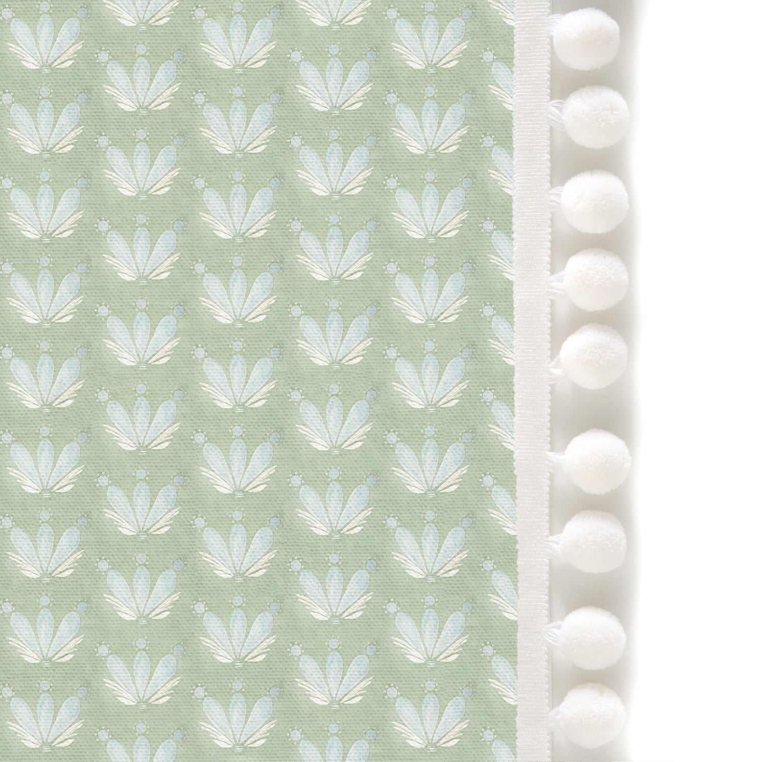 Upclose picture of Serena Sea Salt custom shower curtain with snow pom pom trim