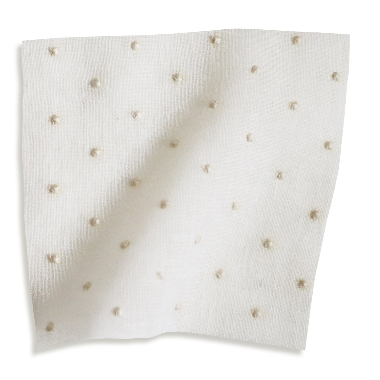 sheer white embroidered cream polka dot fabric swatch