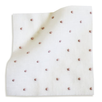 sheer white embroidered pink polka dot fabric swatch