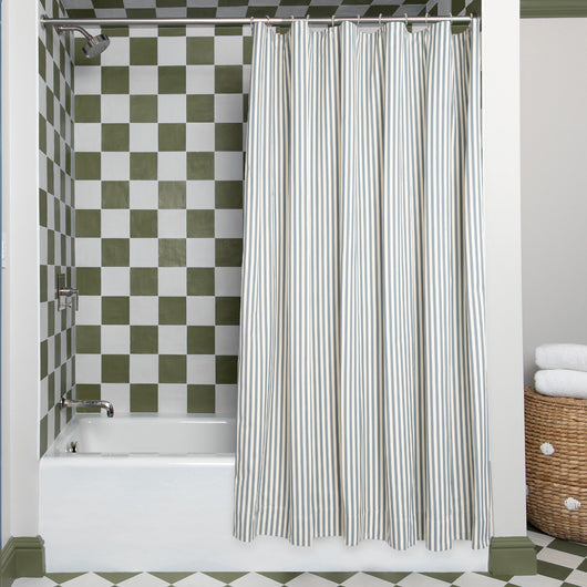 Louisa Harbor Unlined custom shower curtain in a stylish bathroom with checkered tiles and modern fixtures by Pepper Home