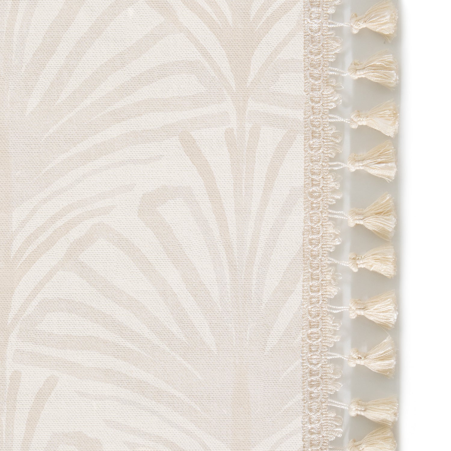 Upclose picture of Suzy Sand custom Beige Palmshower curtain with cream tassel trim