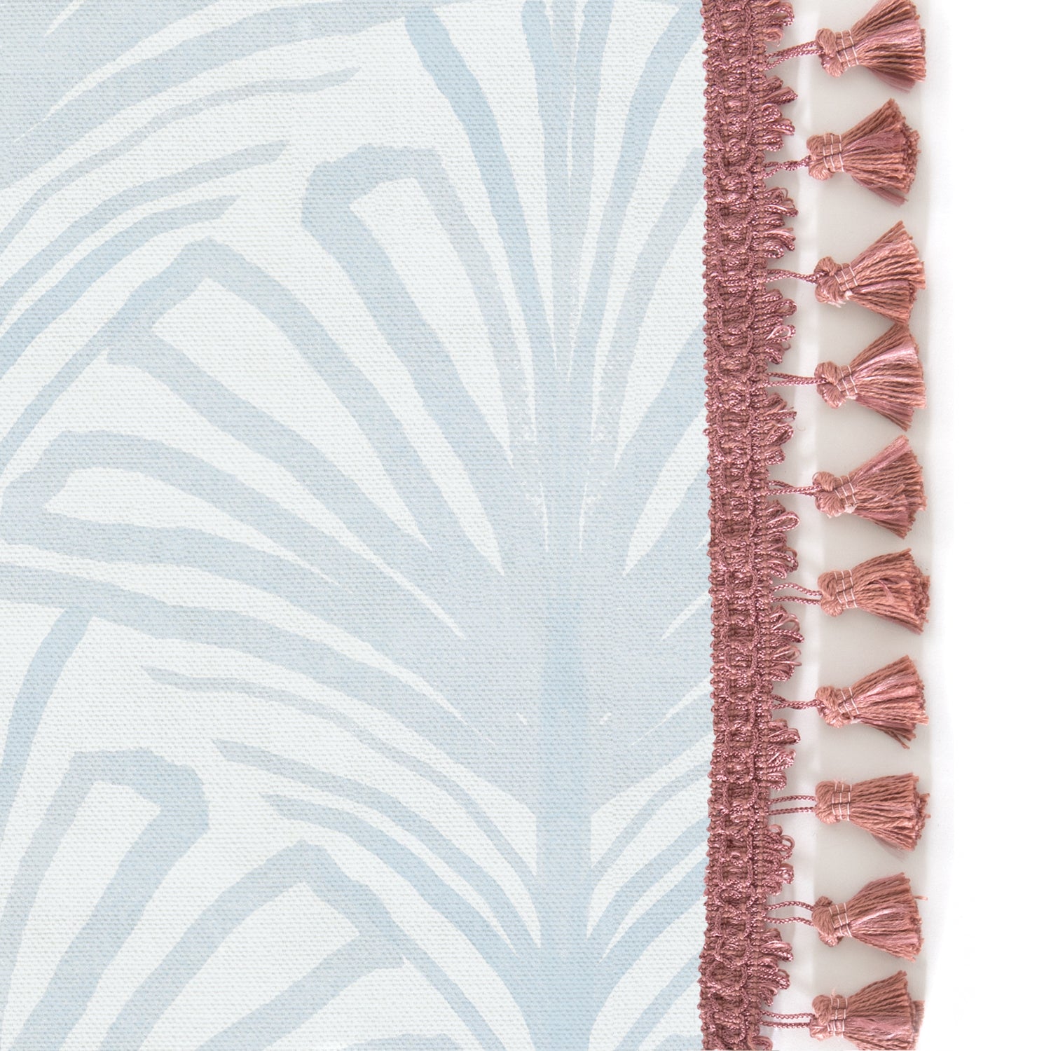 Upclose picture of Suzy Sky custom Sky Blue Palmshower curtain with dusty rose tassel trim