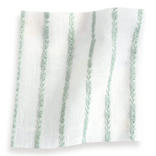 sheer white fabric swatch with embroidered mint green stripes 