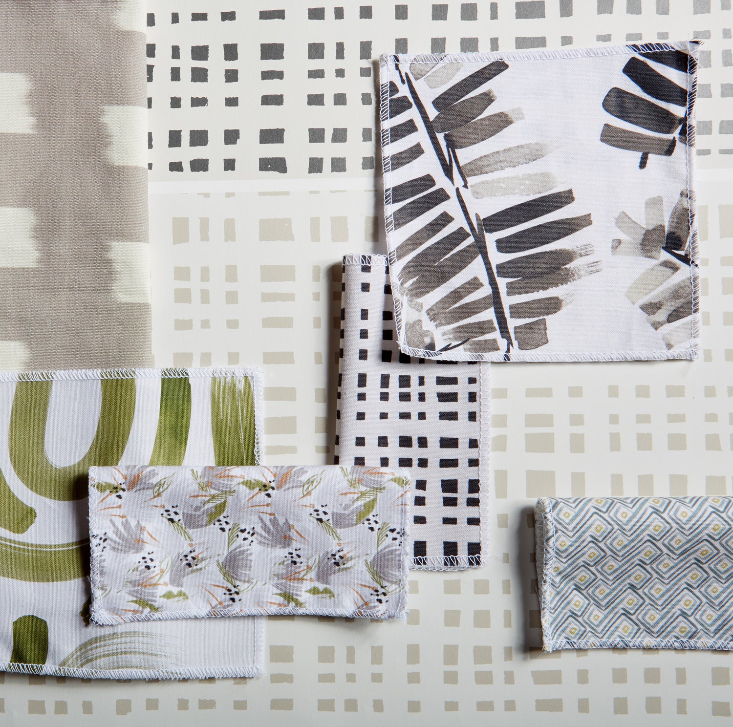 Interior design moodboard and fabric inspirations with Grey Floral Printed swatch, Cream Gingham Pattern Printed Swatch, and Black Gingham printed swatch.