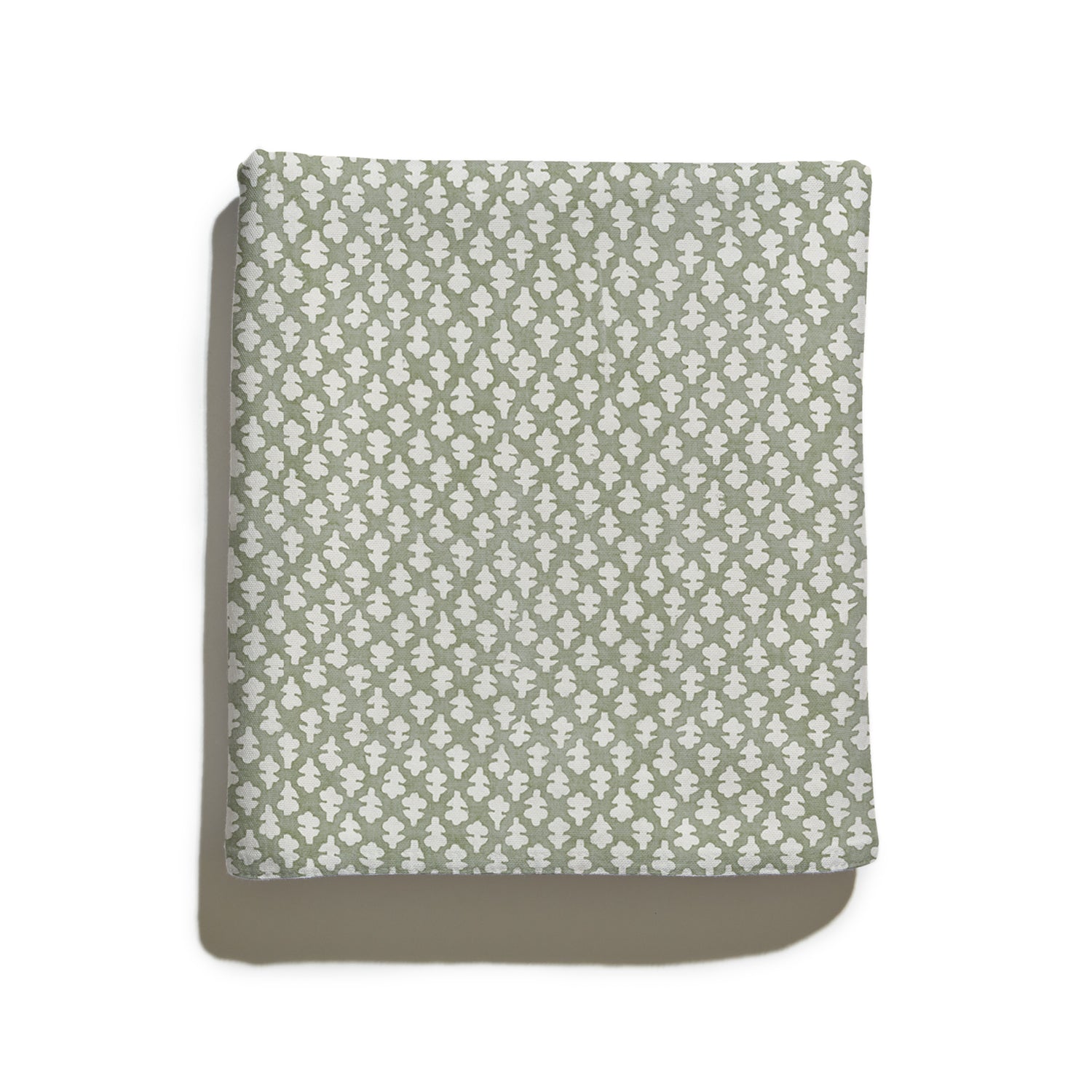 Quinn Eucalyptus cotton fabric with a soft botanical print in green and cream, made-to-order quality design